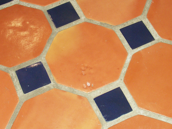 Octagon handmade Terracotta floor tiles with blue ceramic mosaics Pakistan