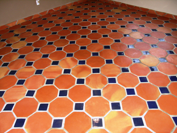 Octagon terracotta floor tiles and blue mosaic with skirting Pakistan